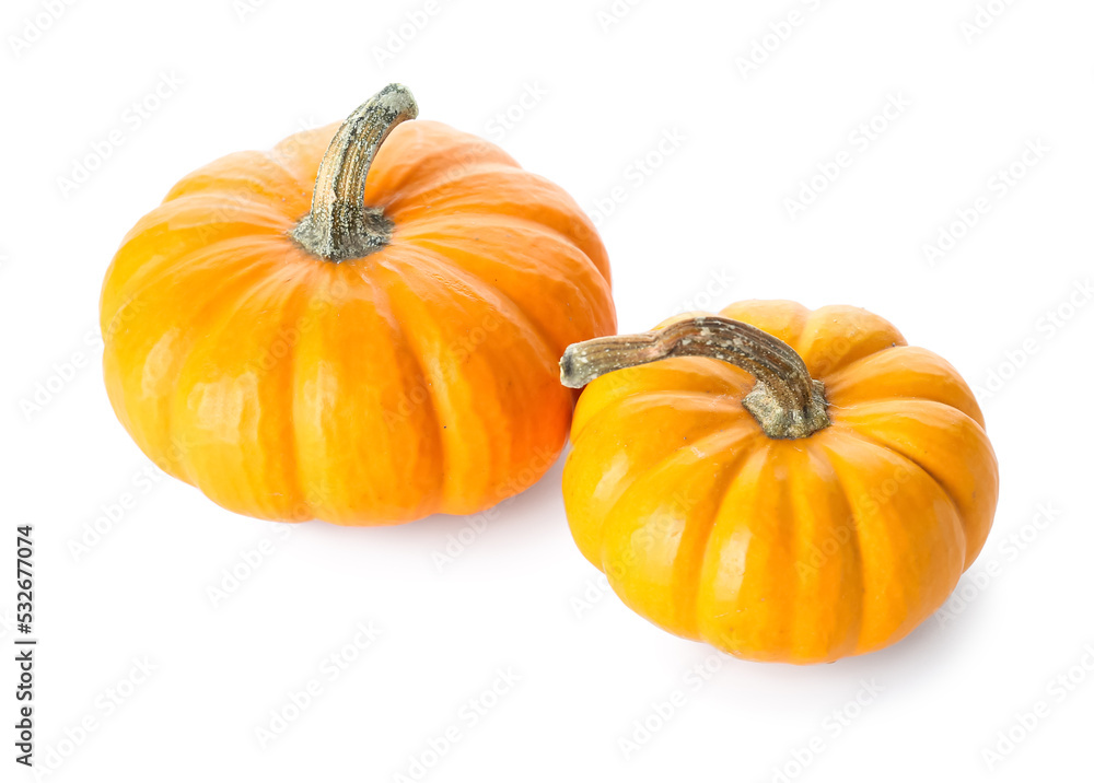 Ripe Halloween pumpkins on white background