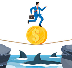 Wall Mural - Businessman walking a tightrope over shark in sea