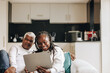 © Jacob Lund - Cheerful senior couple having a video call on a digital tablet