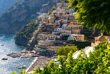 Positano Panorama On The Famous Amalfi Coast In Campania Italy. Picturesque Historic Village With Colorful Houses Built On The Steep Coastline. Summer Atmosphere In Popular Tourist Destination. 