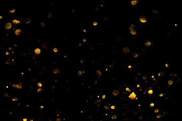 Wall Mural - Golden glitter bokeh sparkles lights dark abstract texture overlay background