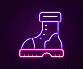 Sticker - Glowing neon line Waterproof rubber boot icon isolated on black background. Gumboots for rainy weather, fishing, gardening. Colorful outline concept. Vector