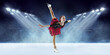 © master1305 - Beautiful female beginner figure skater in stage dress skating at ice arena with spotlights. Dance, winter sports, achievements, champion concept