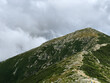 Rocky, pointing and lush mountains with their peaks in the sky and clouds. These dramatic mountain ranges and in New Hampshire.