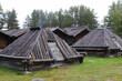 View of buildings in the Arvidsjaur Sami village with overnight wodden church cootages and gåhties.