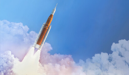 Leinwandbilder - Space launch system flight in space from Earth. SLS rocket in sky. Mission on Moon of Orion spacecraft. Spaceship take off. Artemis space program. Elements of this image furnished by NASA