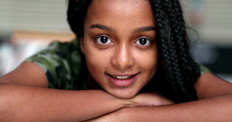 Wall Mural - African descent teen girl portrait close-up face