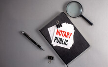 NOTARY PUBLIC Text On A Sticky On Black Notebook , Business Concept