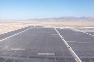 Aerial view of solar energy farm producing clean renewable energy from the sun 