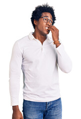 Sticker - Handsome african american man with afro hair wearing casual clothes and glasses looking stressed and nervous with hands on mouth biting nails. anxiety problem.