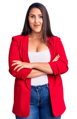 Poster - Young beautiful brunette woman wearing elegant clothes happy face smiling with crossed arms looking at the camera. positive person.