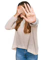 Poster - Young blonde woman wearing casual clothes covering eyes with hands and doing stop gesture with sad and fear expression. embarrassed and negative concept.