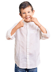 Poster - Cute blond kid wearing elegant shirt smiling cheerful showing and pointing with fingers teeth and mouth. dental health concept.