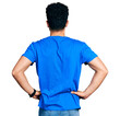 © Krakenimages.com - Young arab man with beard wearing casual blue t shirt standing backwards looking away with arms on body