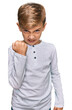 © Krakenimages.com - Little caucasian boy kid wearing casual clothes angry and mad raising fist frustrated and furious while shouting with anger. rage and aggressive concept.