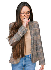 Canvas Print - Young hispanic girl wearing business clothes and glasses feeling unwell and coughing as symptom for cold or bronchitis. health care concept.