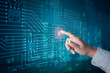 © Ake Studio - Internet network security concept with hand pressing key lock icon on technology screen. Hand pointing circuit network security protection social media and dark background.