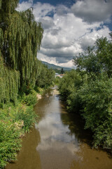 Wall Mural - small river in Prundu Bargaului, bISTRITA,Romania, 2022