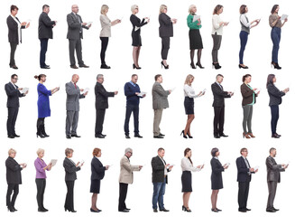 group of people holding tablet and looking ahead