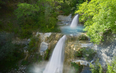 Wall Mural - aerial view of two waterfalls in tuscany