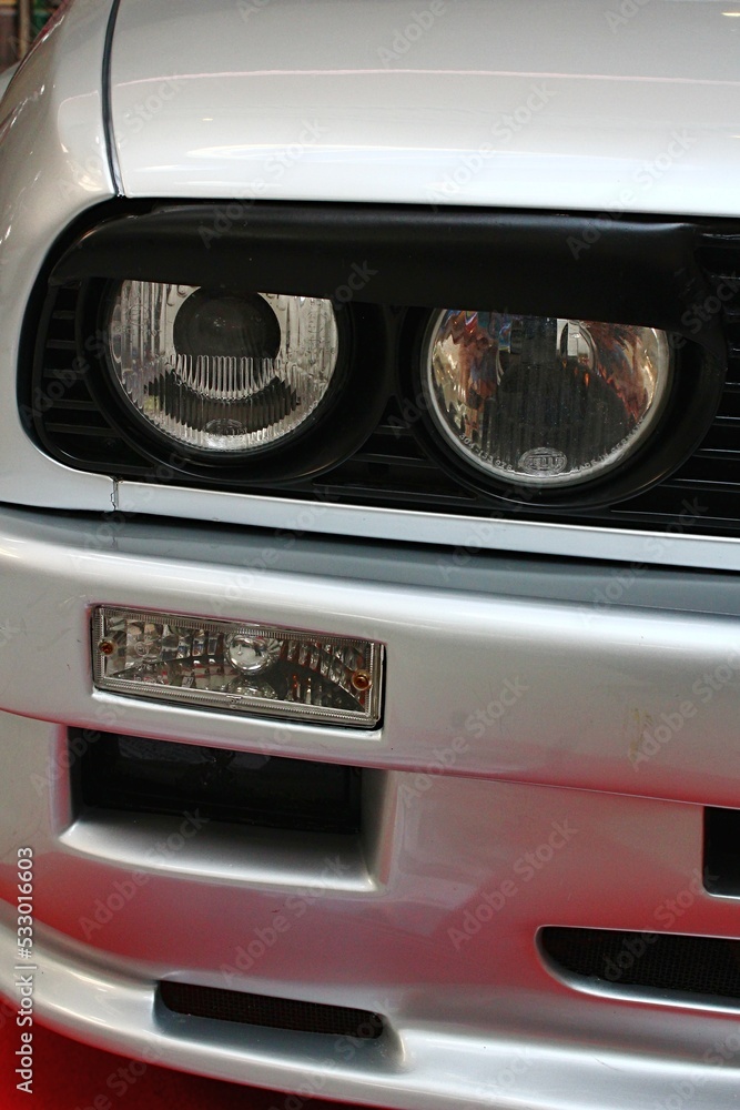 Twin front headlights of first generation of high performance compact ...