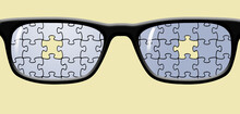 A  Jigsaw Puzzle Is Reflected In A Pair Of Eyeglasses In This 3-d Illustration.