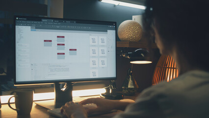 Wall Mural - male web designer using personal computer for creating website in professional constructor while wor