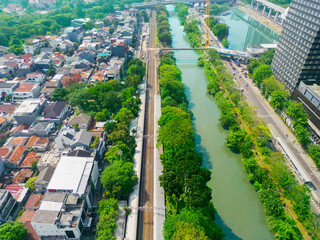 Wall Mural - Top down view of rail track near CIliwung river