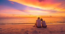 Love Couple Watching Sunset Together On Beach Travel Summer Holidays. People Silhouette From Behind Sitting Enjoying View Sunset Sea Tropical Island, Destination Vacation. Romantic Freedom Lifestyle