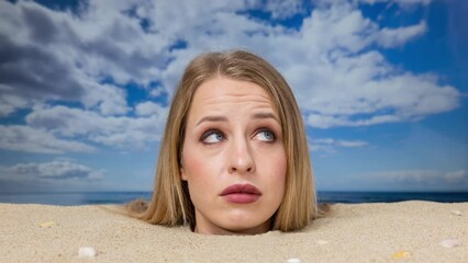 Wall Mural - Woman buried in sand on beach