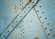Rusty background with metal rivets