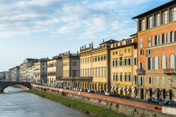 Wall Mural - The Ponte Vecchio, Old Bridge, is a Medieval stone closed-spandrel segmental arch bridge over the Arno River, with shops built along it; as jewelers, art dealers and souvenir sellers. Italy, 2019