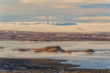 mývatn is a shallow lake situated in an area of active volcanism in the north of iceland.