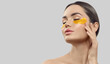 © Subbotina Anna - Woman with under eye collagen gold pads, patches, beauty model girl face with healthy fresh skin. Skin care concept, anti-aging moisturizing eye mask, golden hydrogel, eye skin treatment, cosmetology