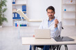 © Elnur - Young male doctor in wheel-chair working in the clinic