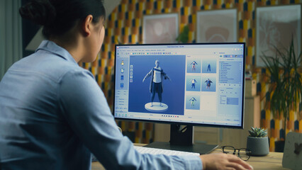 Wall Mural - female 3d designer having remote work on 3d modeling and creating 3d visualization of clothes using 
