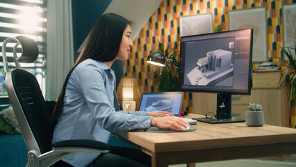 Wall Mural - female asian 3d designer at home working on 3d modeling project of house and making exterior in prof