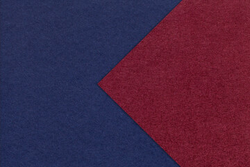 Wall Mural - Texture of navy blue paper background, half two colors with dark red arrow, macro. Craft wine cardboard.