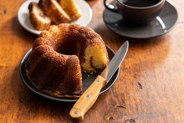 Wall Mural - Sweet sponge cake. Bundt cake on wooden table.