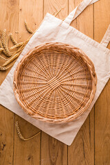 Wall Mural - Willow wicker tray on wooden background