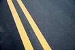 © xy - Double yellow lines on asphalt road