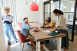 © Westend61 - Business people working together in modern coworking space