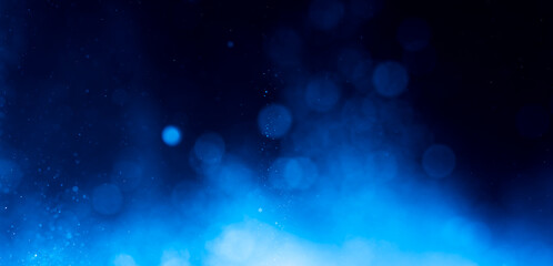 Wall Mural - abstract blue bokeh defocus glitter blur background.
