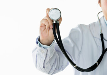 Wall Mural - Close up of female doctor listening with a stethoscope