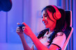 © Kawee - Asian young e-sport woman gamer play online mobile game on smartphone.