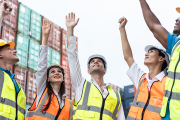 Wall Mural - Group of young male and female worker working in container terminal.