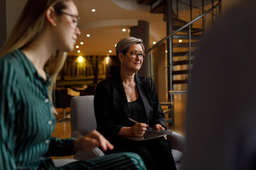 Wall Mural - Female executive using digital tablet in office