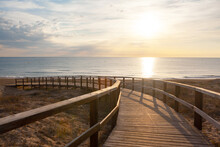 Sunrise Beach Boardwalk With Dunes And Sea Oats
