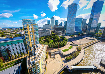 Wall Mural - Aerial view of skyscrappers of the Canary Wharf, the business district of London on the Isle of Dogs