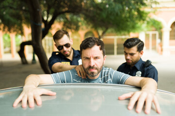 Wall Mural - Upset criminal suspect during his police arrest